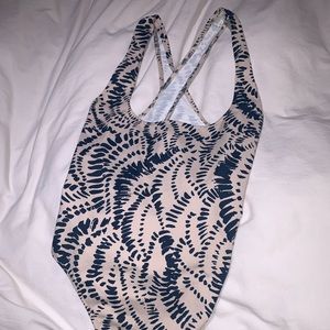 Cream and blue Free People cross back body suit
